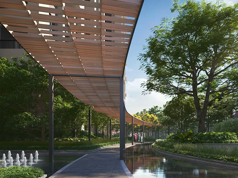 Shaded walkway alongside the podium water body